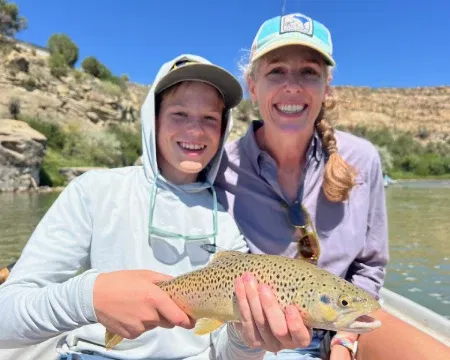 mother-son-with-brown-trout Mother son with brown trout