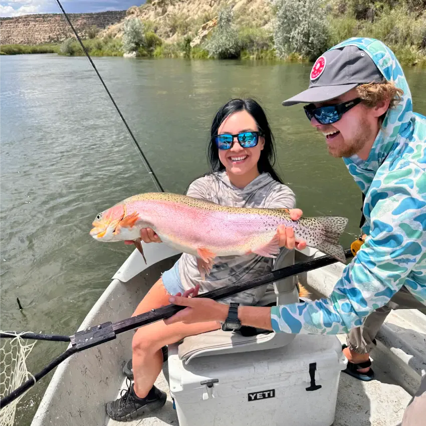 Fisheads guide and girl with large rainbow trout 850
